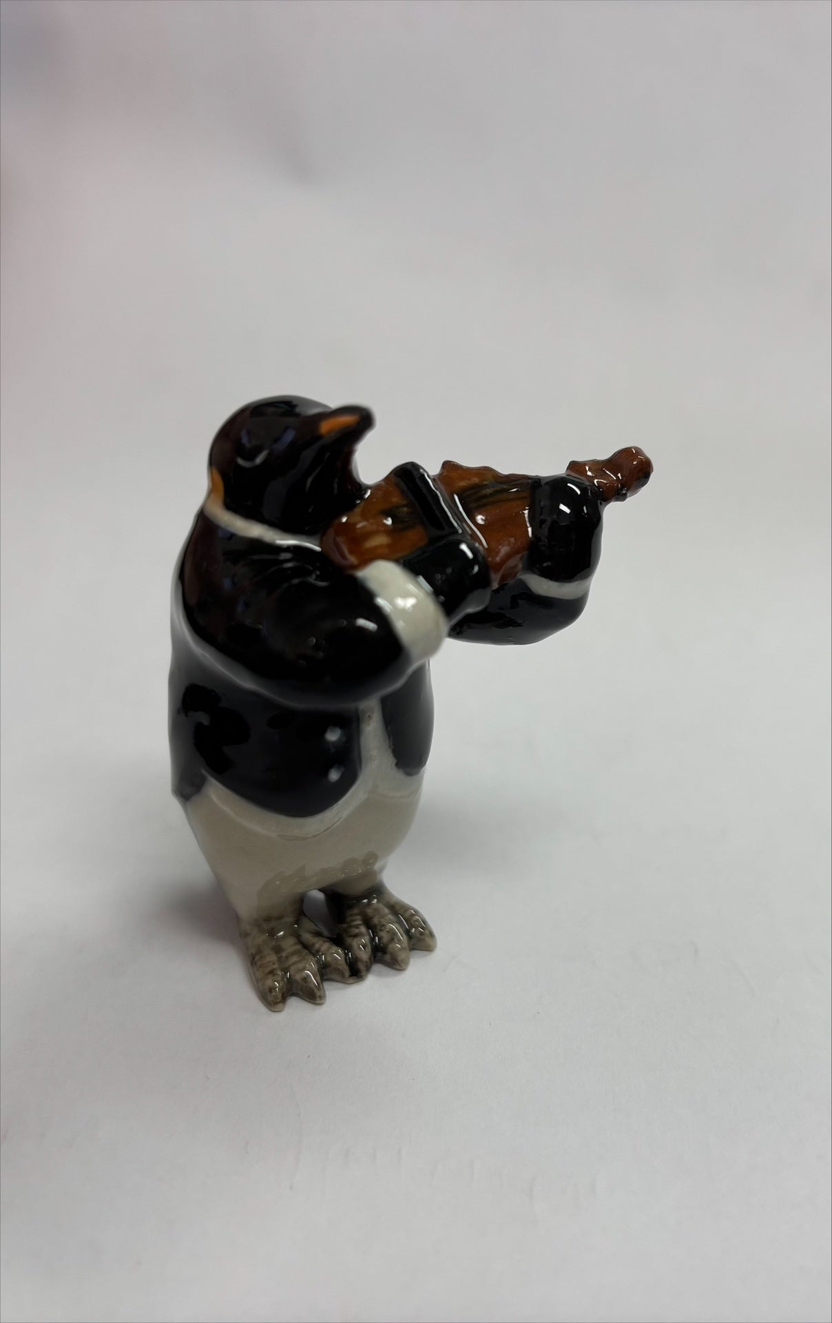 Penguin Playing the Violin Porcelain Figurine